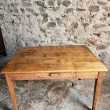 Antique French dining table with drawer, around 1900.