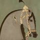 Painted canvas featuring a light-coloured Indian horse in profile. Contemporary.