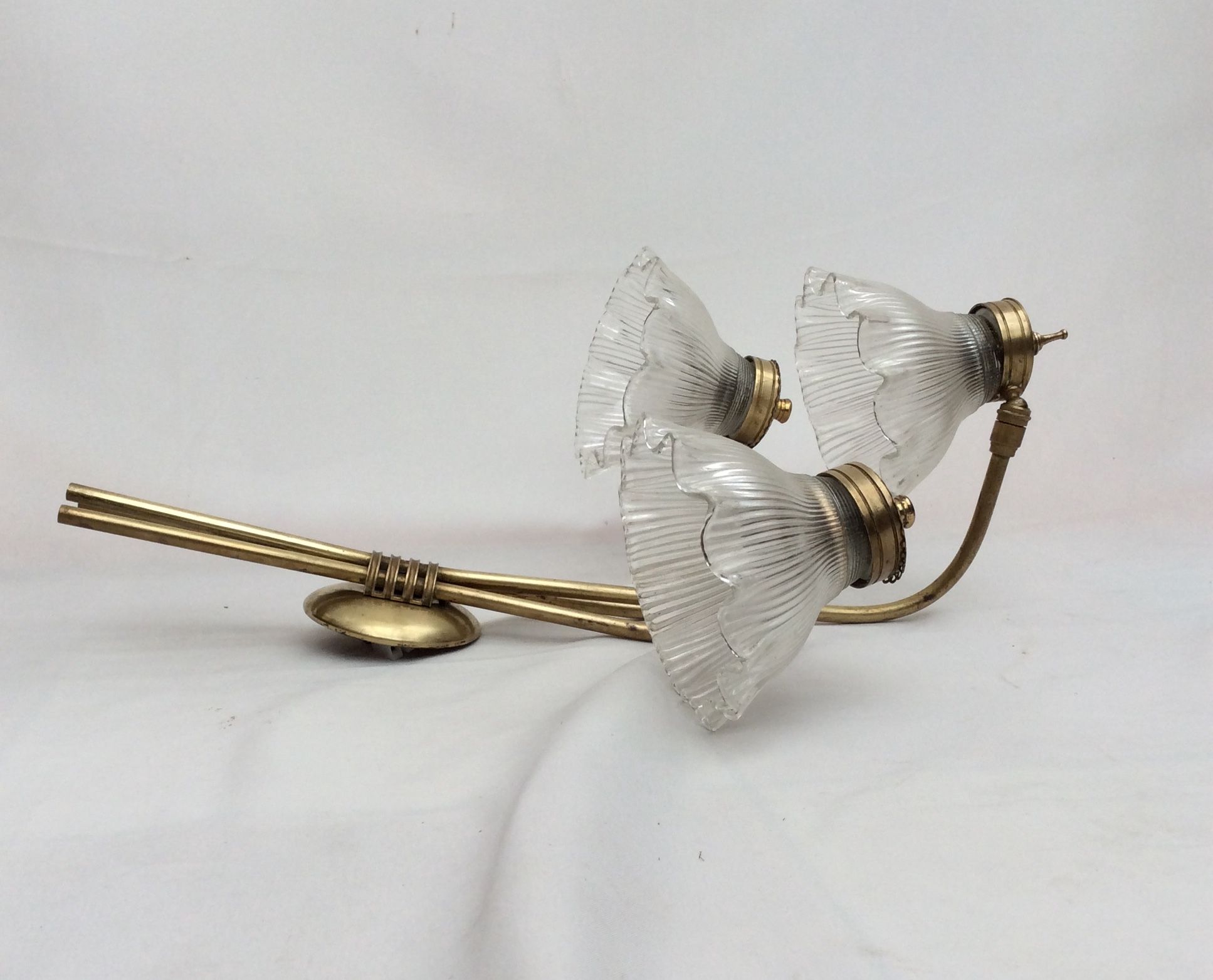 Bronze sconce with three glass tulips