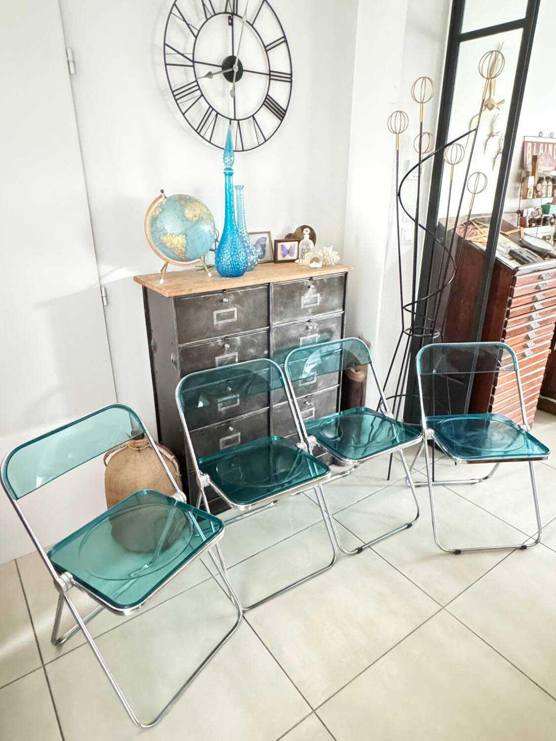 Set of 4 blue Plia folding chairs by Castelli