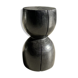 End of black sofa two half-spheres in monoxyl solid wood