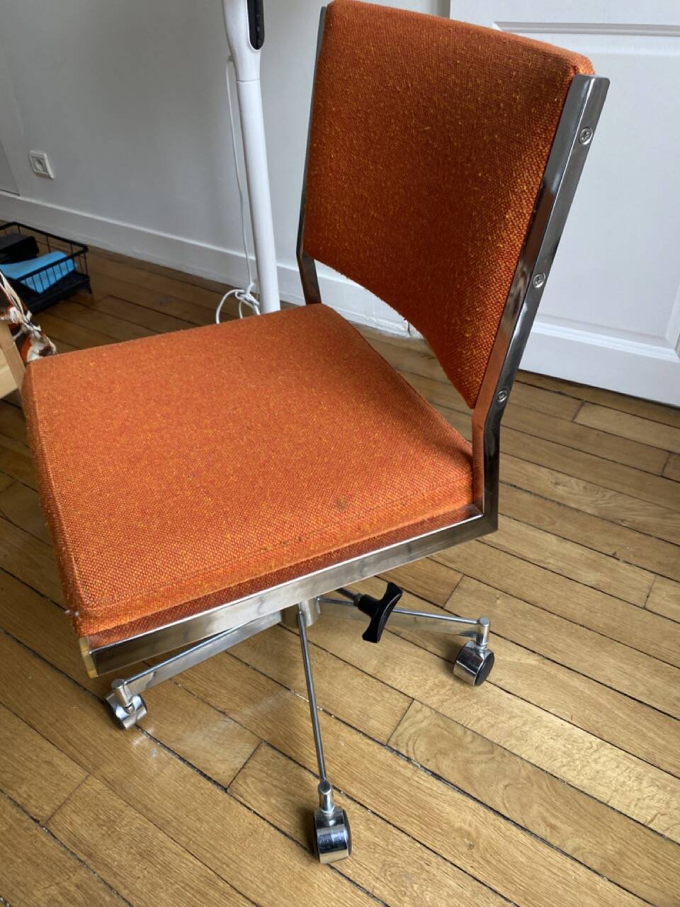 Orange office chair in 70s style