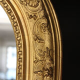 Very large exceptional mirror. Original gold leaf gilding, mercury ice cream