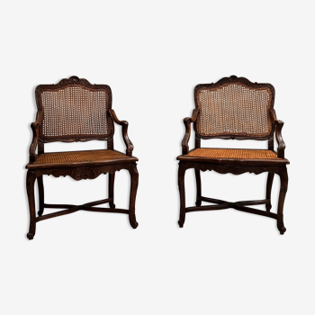 Pair of armchairs with cane bottom of epoch regence xviiieme