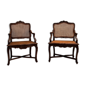 Pair of armchairs with cane bottom of epoch regence xviiieme