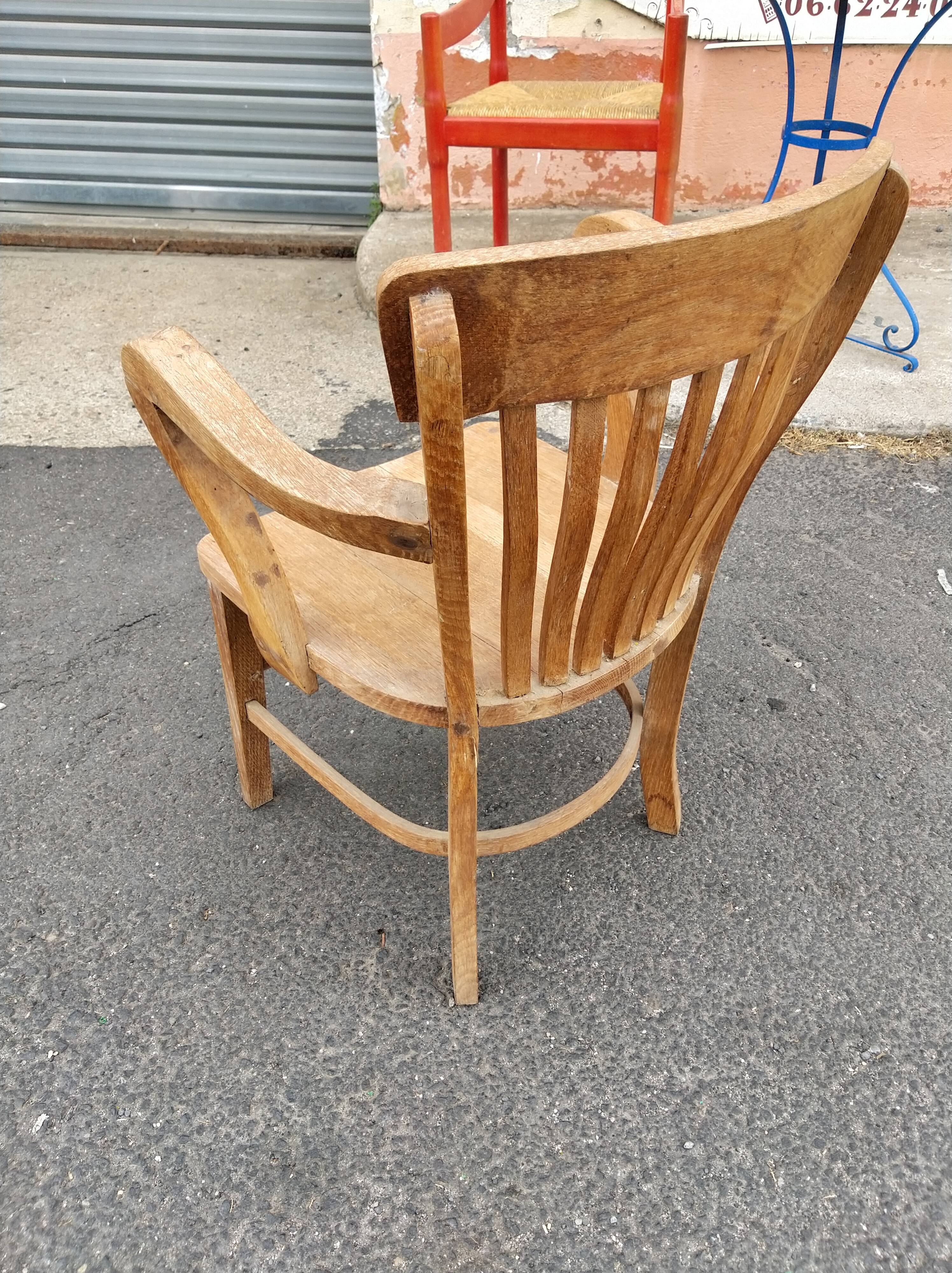 Fauteuil de bureau d'enfant dit "Américain" en chêne vers 1920