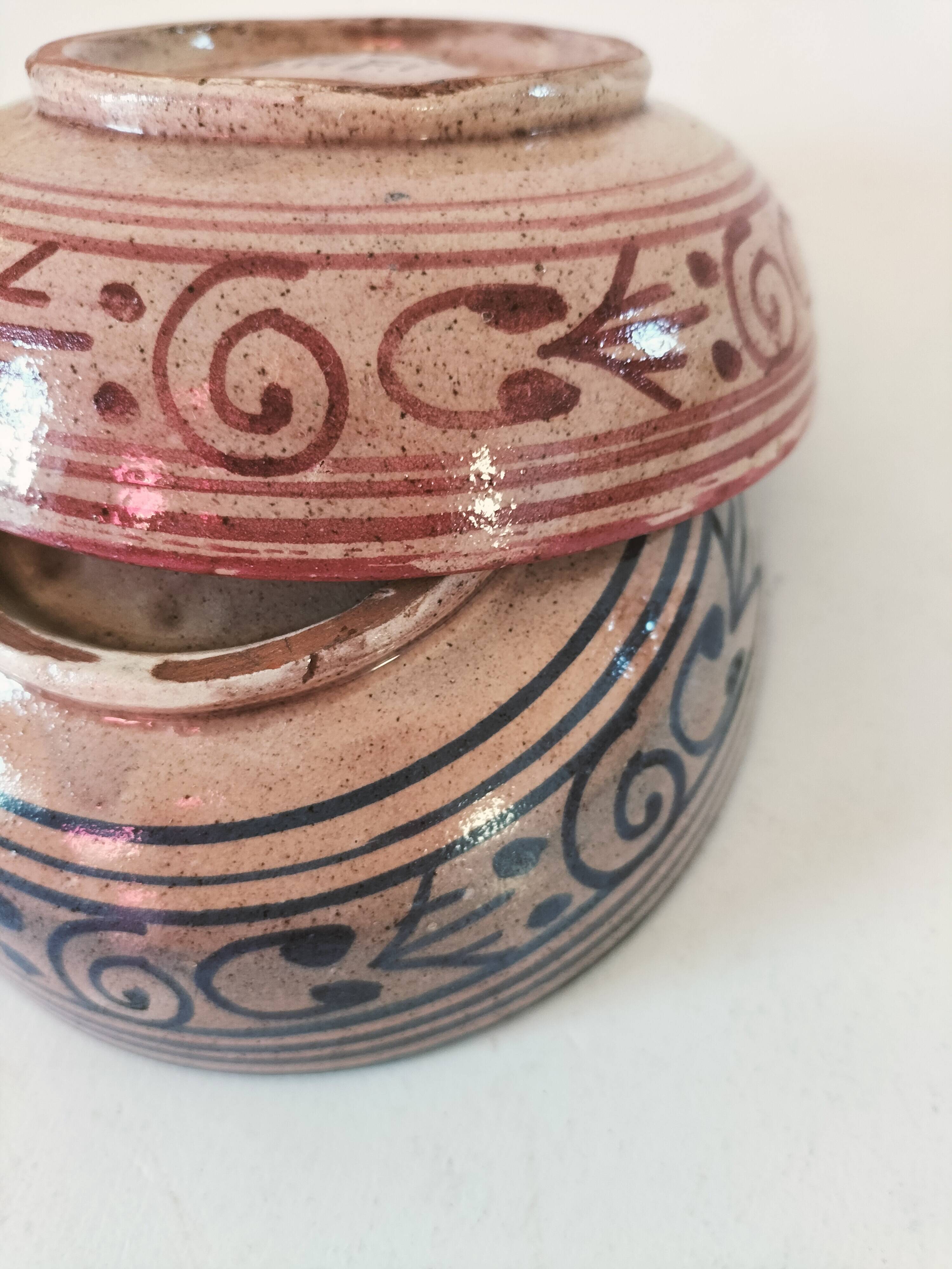 Pair of bowls signed A. Serghini