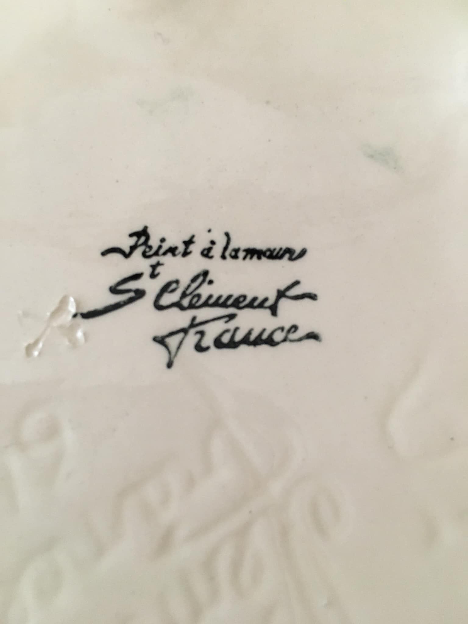 Sugar bowl in slip stamped Saint Clément and numbered 6461. Hand painted.