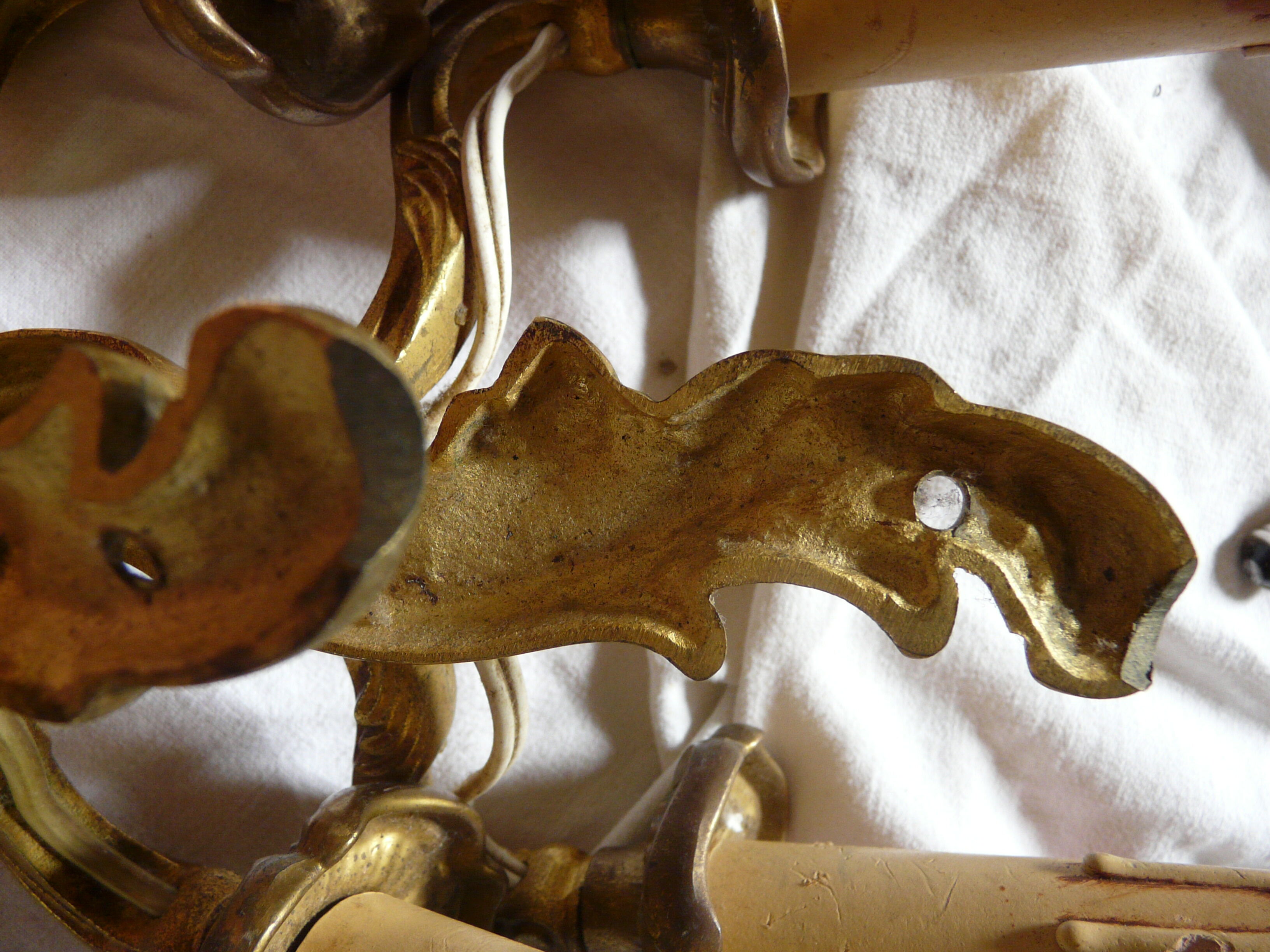 Two pairs of bronze wall lamps