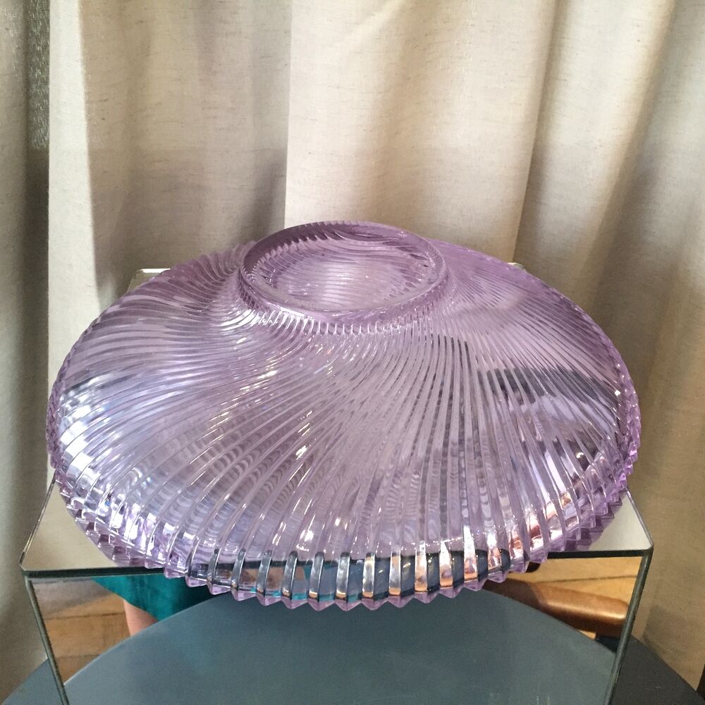 Twisted glass fruit cup of purplish pink color
