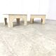 Pair of travertine and brass coffee tables, 1970s