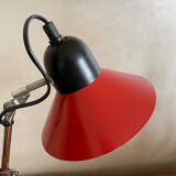 Articulated lamp in red aluminum