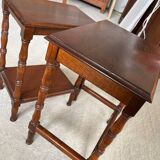 2 wooden nesting tables with molded legs