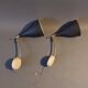 Pair of bedroom sconces in gilded brass and black aluminum 1960.