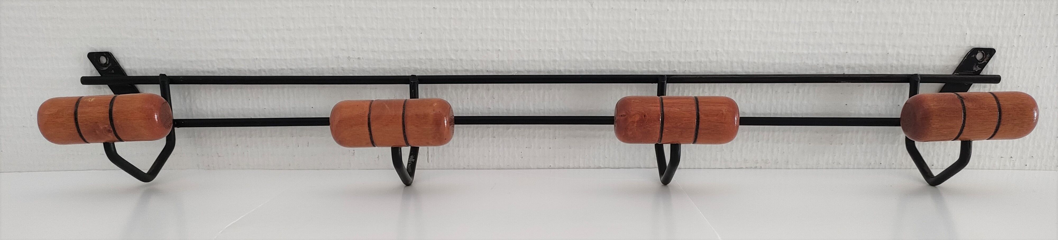 Modernist wall-mounted coat rack in metal and wood, 60s design