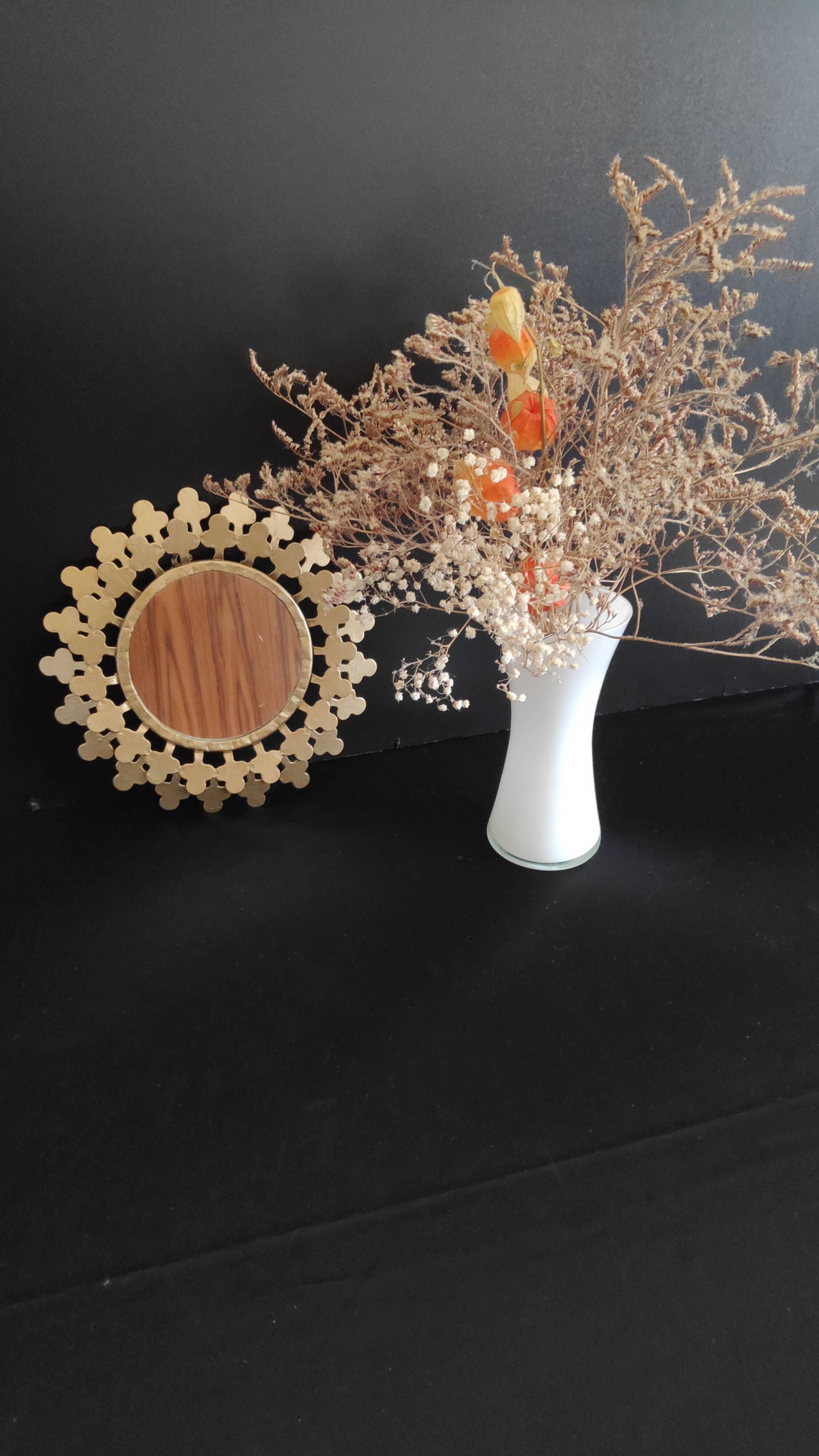 Miroir rond en métal doré