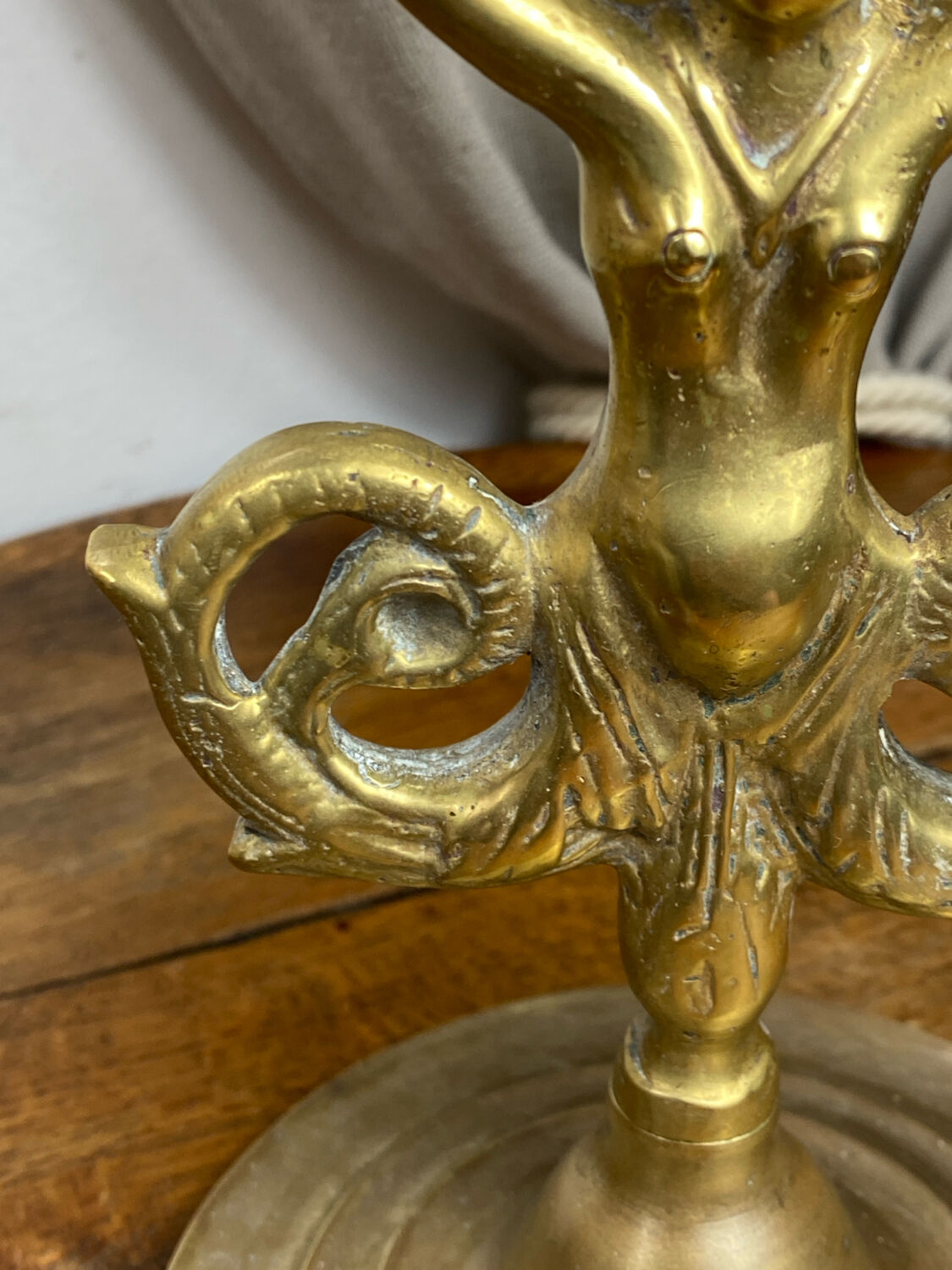 Mermaid-shaped chandelier in bronze