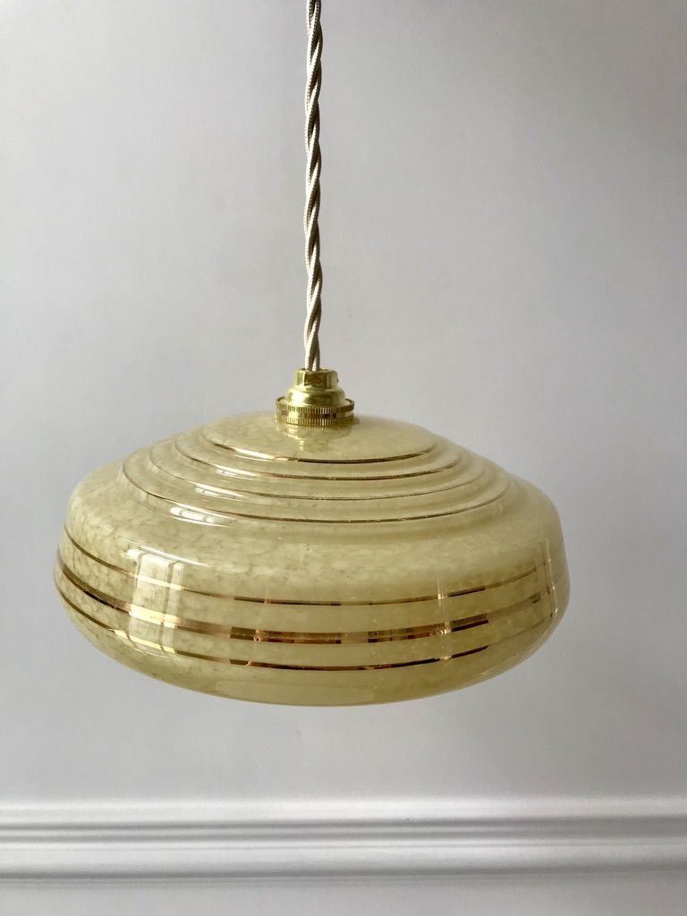 Pair of suspensions in yellow Clichy glass and golden border 40s-50s
