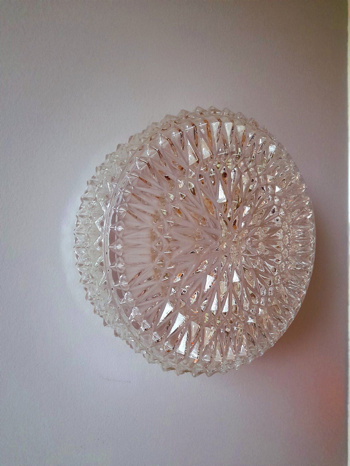 Glass wall or ceiling light from the 1970s.