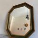 Gold and green wood frame mirror