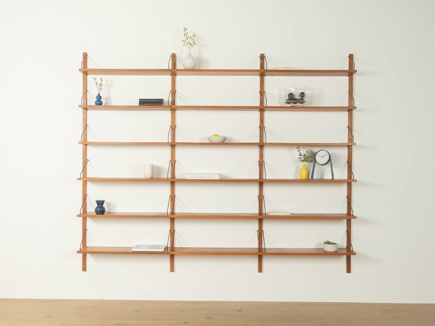 Classic wall shelf by Poul Cadovius for Cado, 1950s, teak veneer, 18 shelves, 4 ladders, Denmark