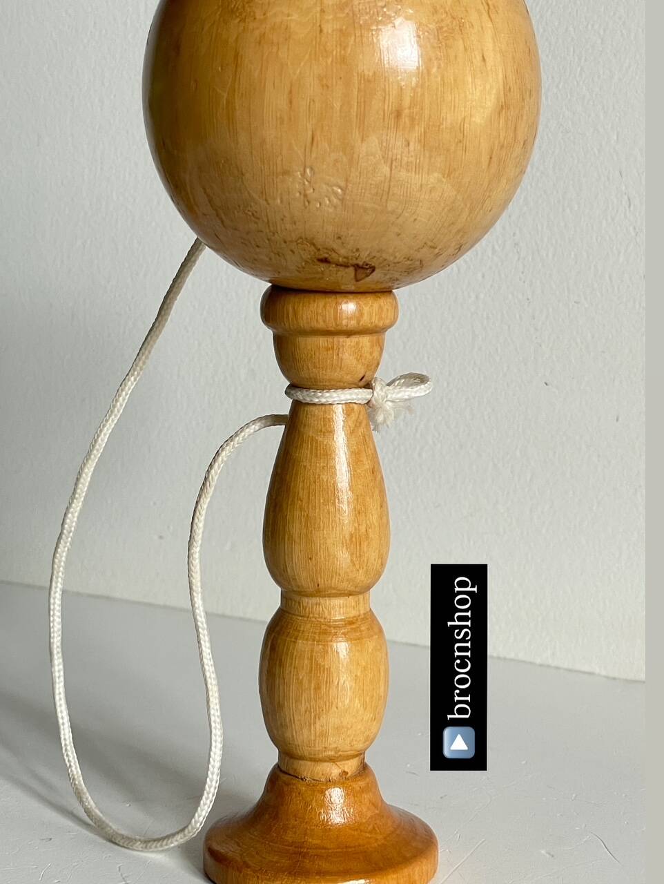 Vintage wooden cup-and-ball toy