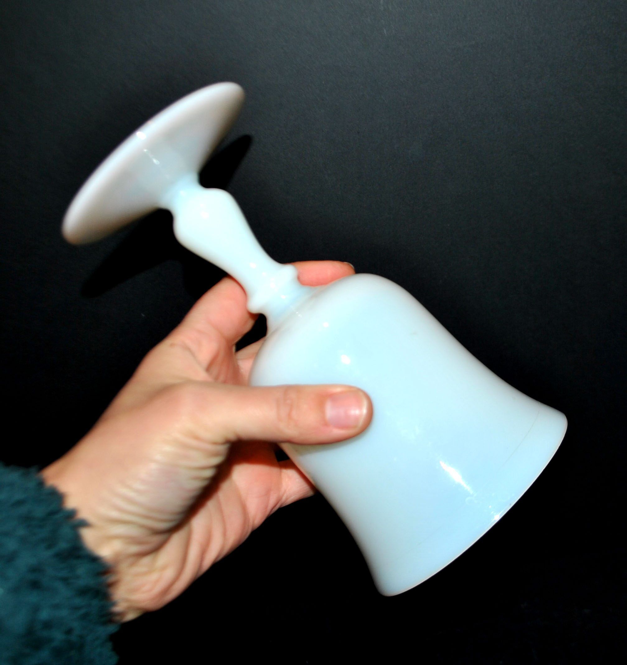 Ancient opaline white glass goblet with a soap bubble effect.