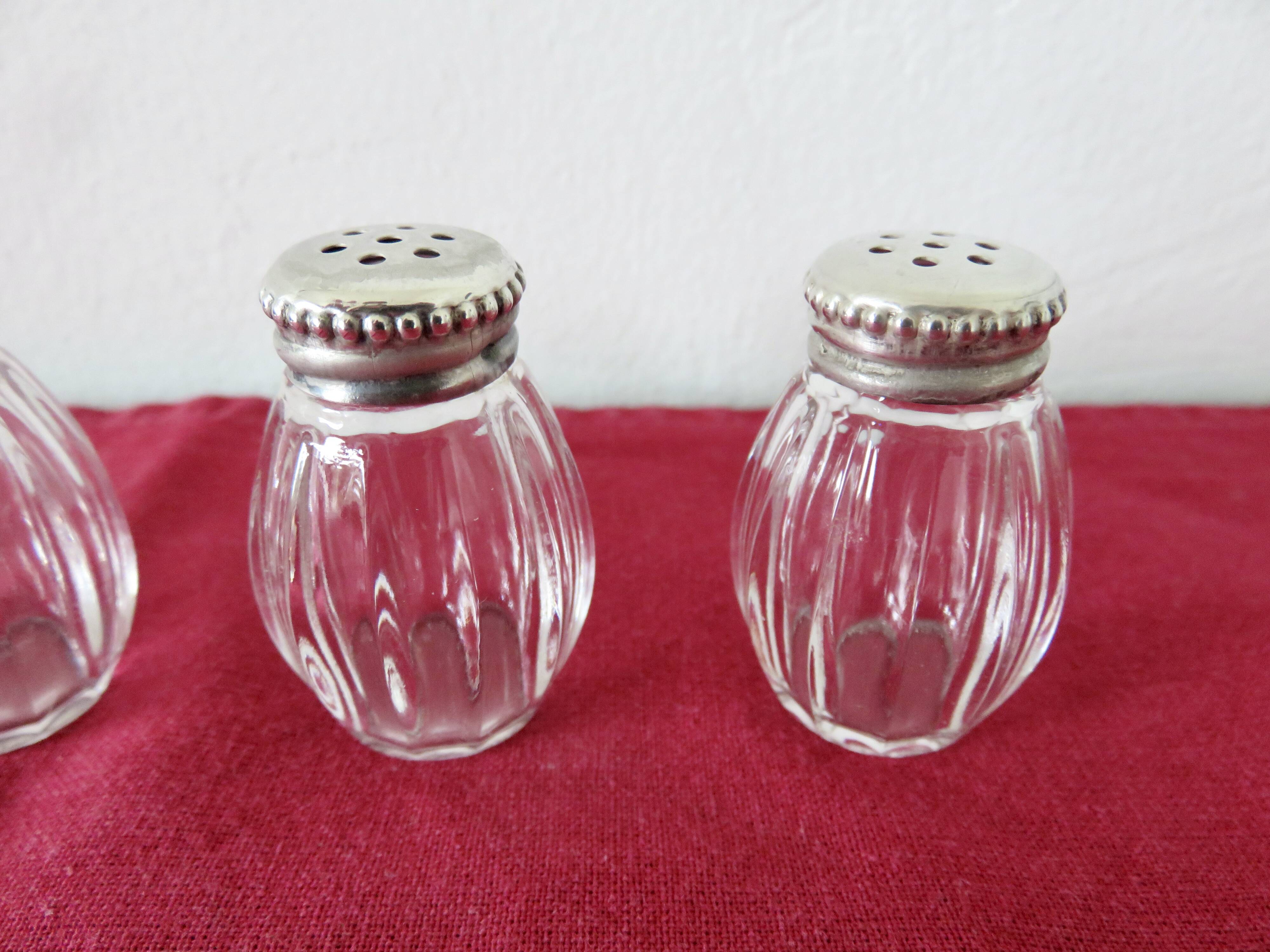 Salt and pepper "CHRISTOFLE" in solid silver in their original box, 1950.