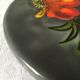 Underside of flat ceramic pink flowers La Roue de Vallauris