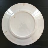 Old plate with floral decoration