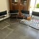 4 chrome tubular chairs
