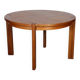 Round extendable dining table in wood published by Monopoly, 1970.