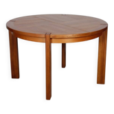 Round extendable dining table in wood published by Monopoly, 1970.