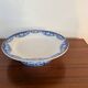 Antique compote dish with blue floral decoration.