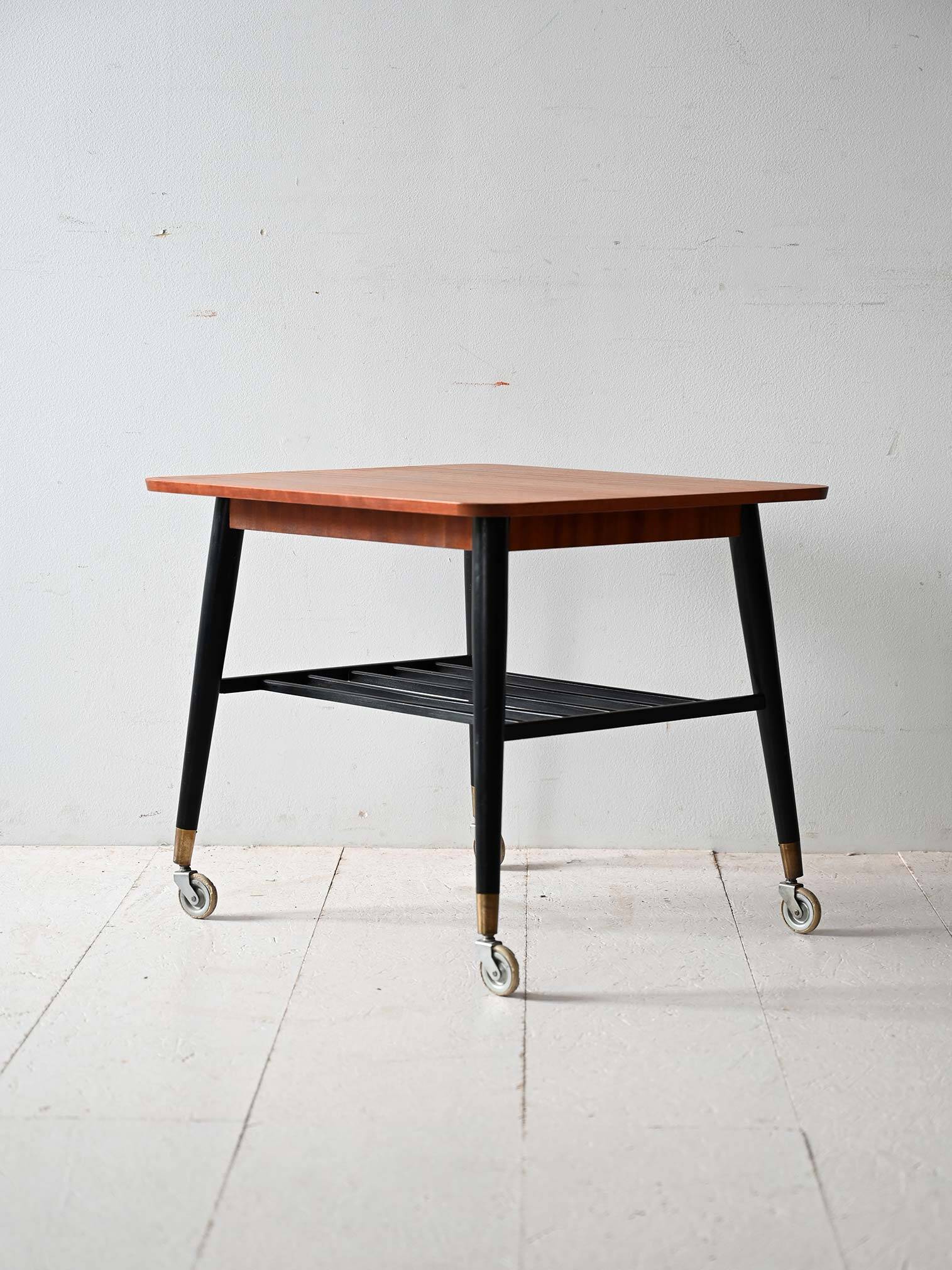 Vintage Scandinavian teak coffee table with castors