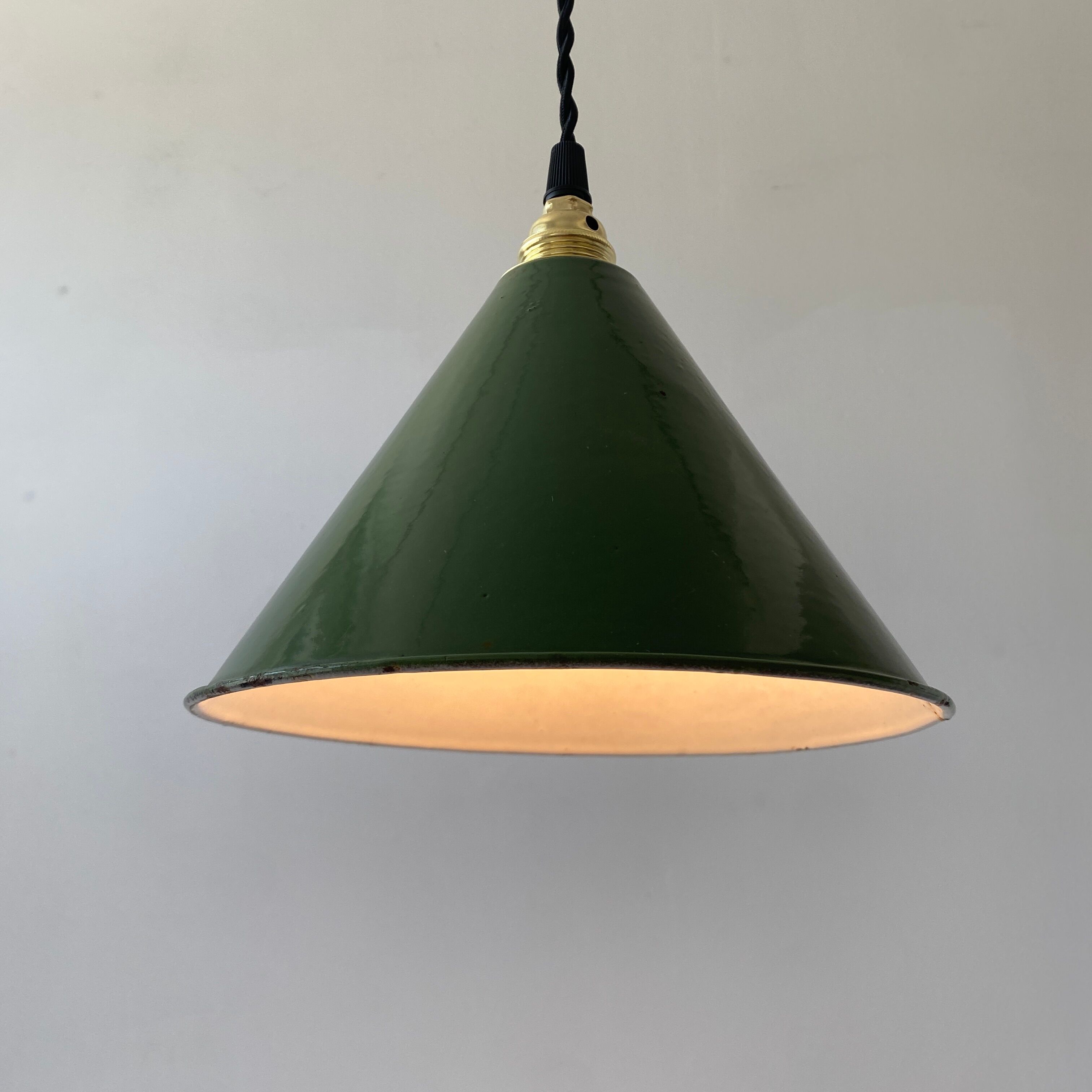 Old green enamelled conical industrial hanging lamp