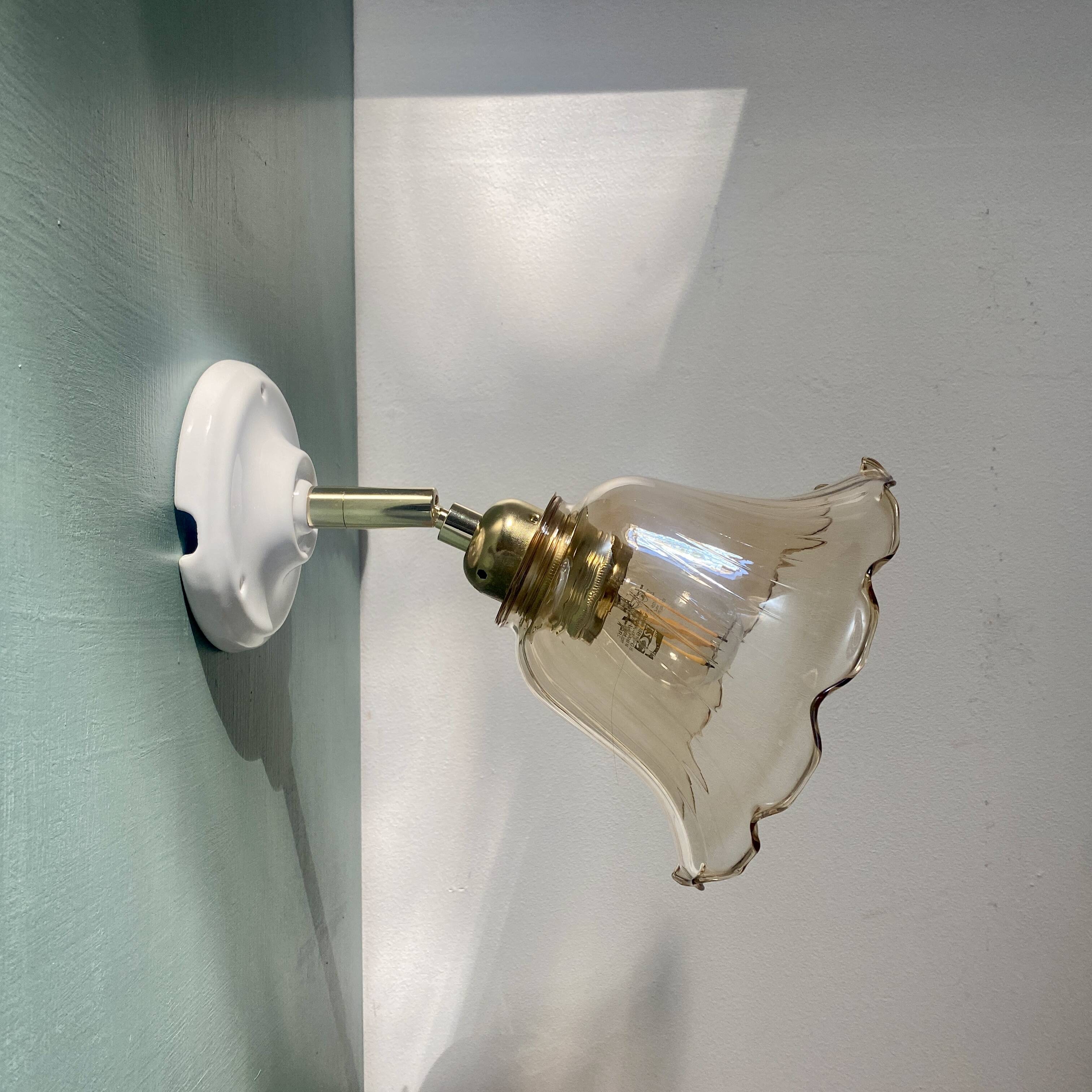 Vintage tulip wall light in amber glass