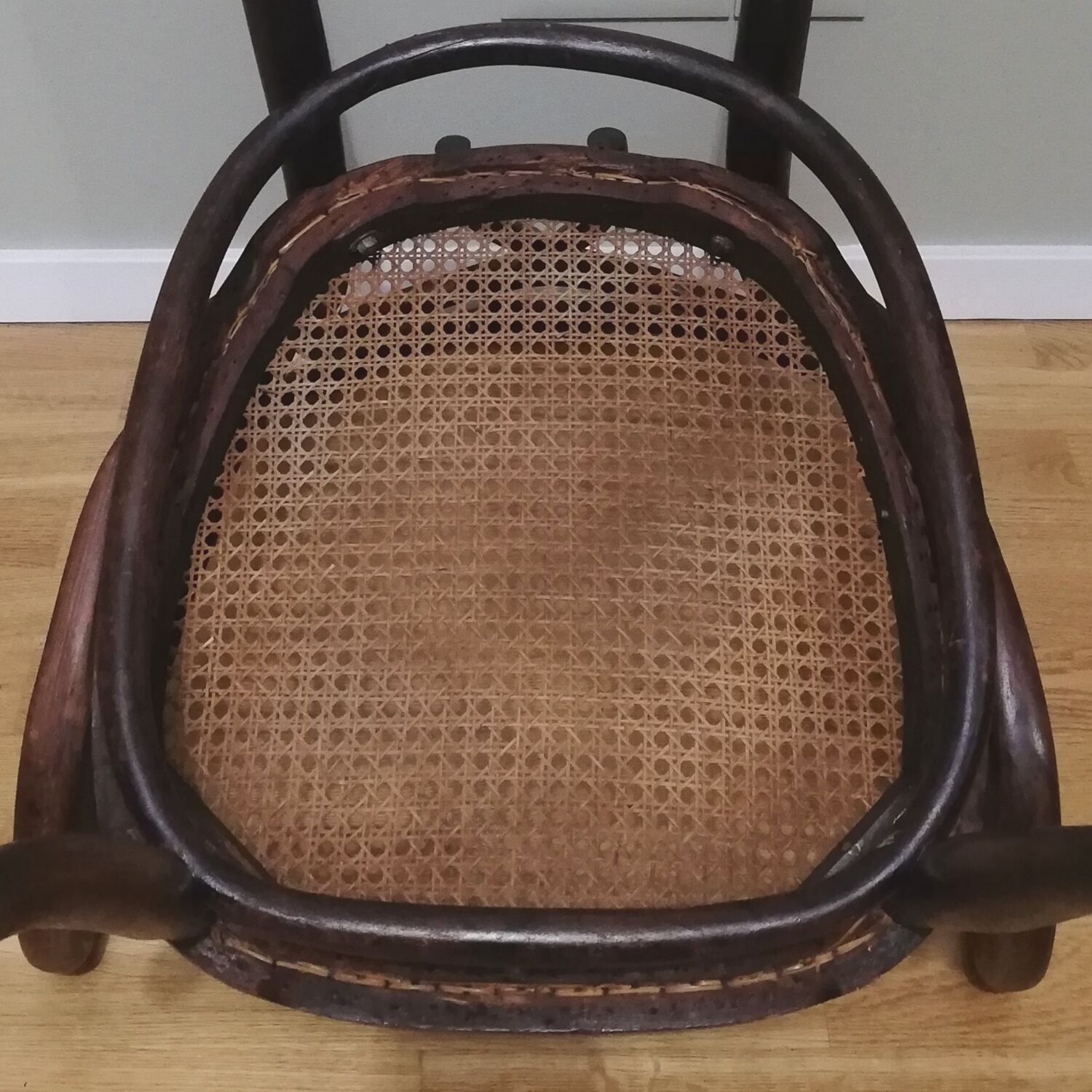 Canned armchair in curved wood signed J.Kohn