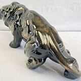 Art Deco lion statue 1930 cracked Saint Clément