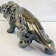Art Deco lion statue 1930 cracked Saint Clément