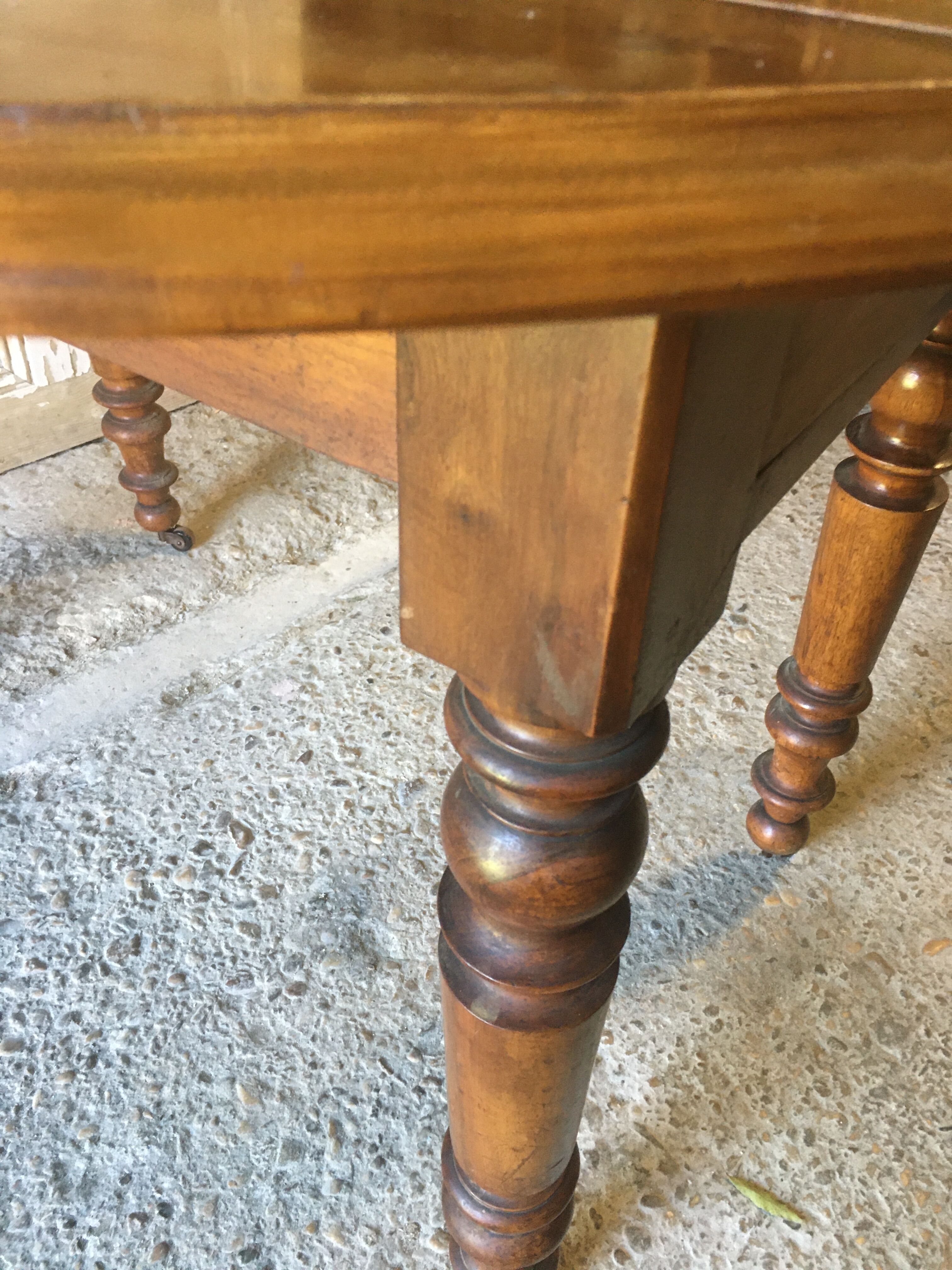 Walnut shutter table with drawer on wheels