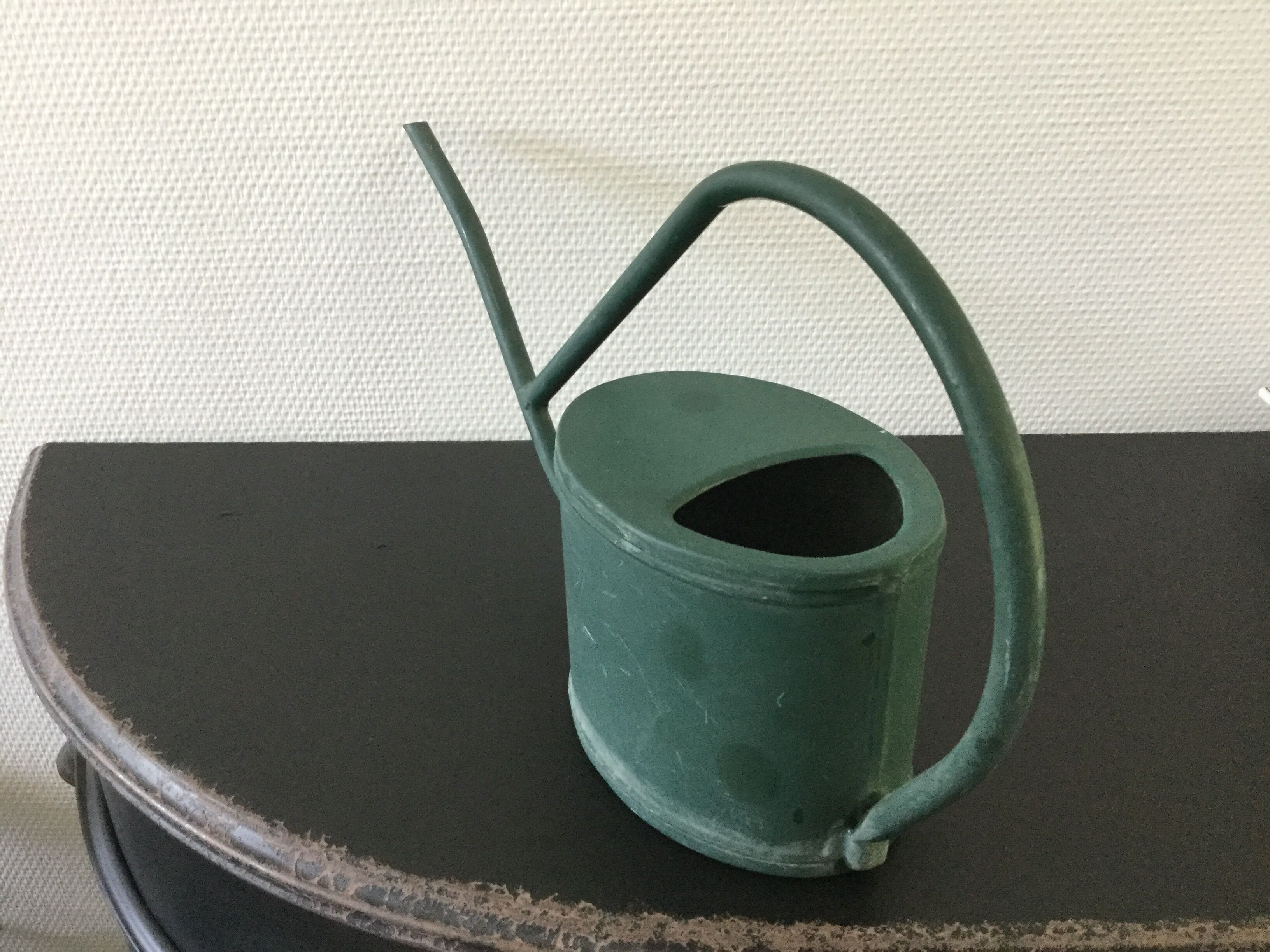 Old watering can