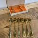 Set of 6 golden dessert forks