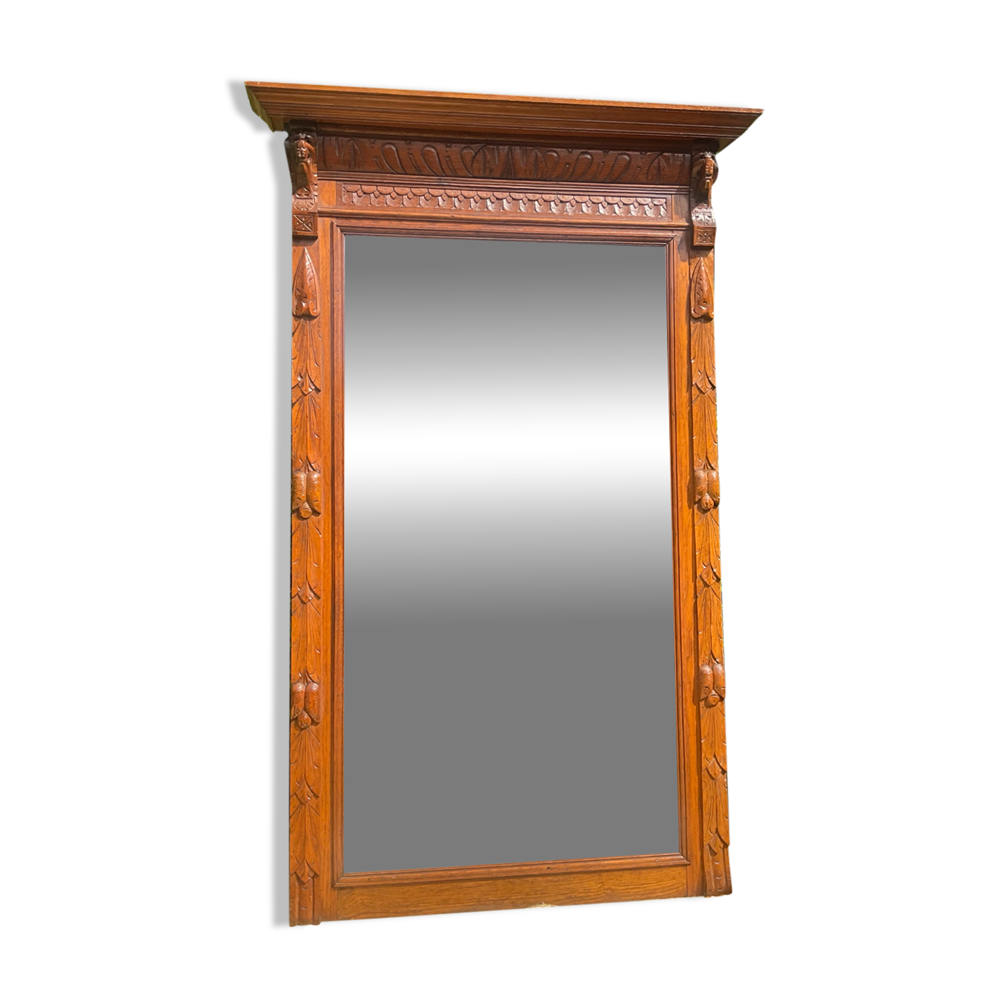 Antique large trumeau mirror in solid wood and bevelled glass.