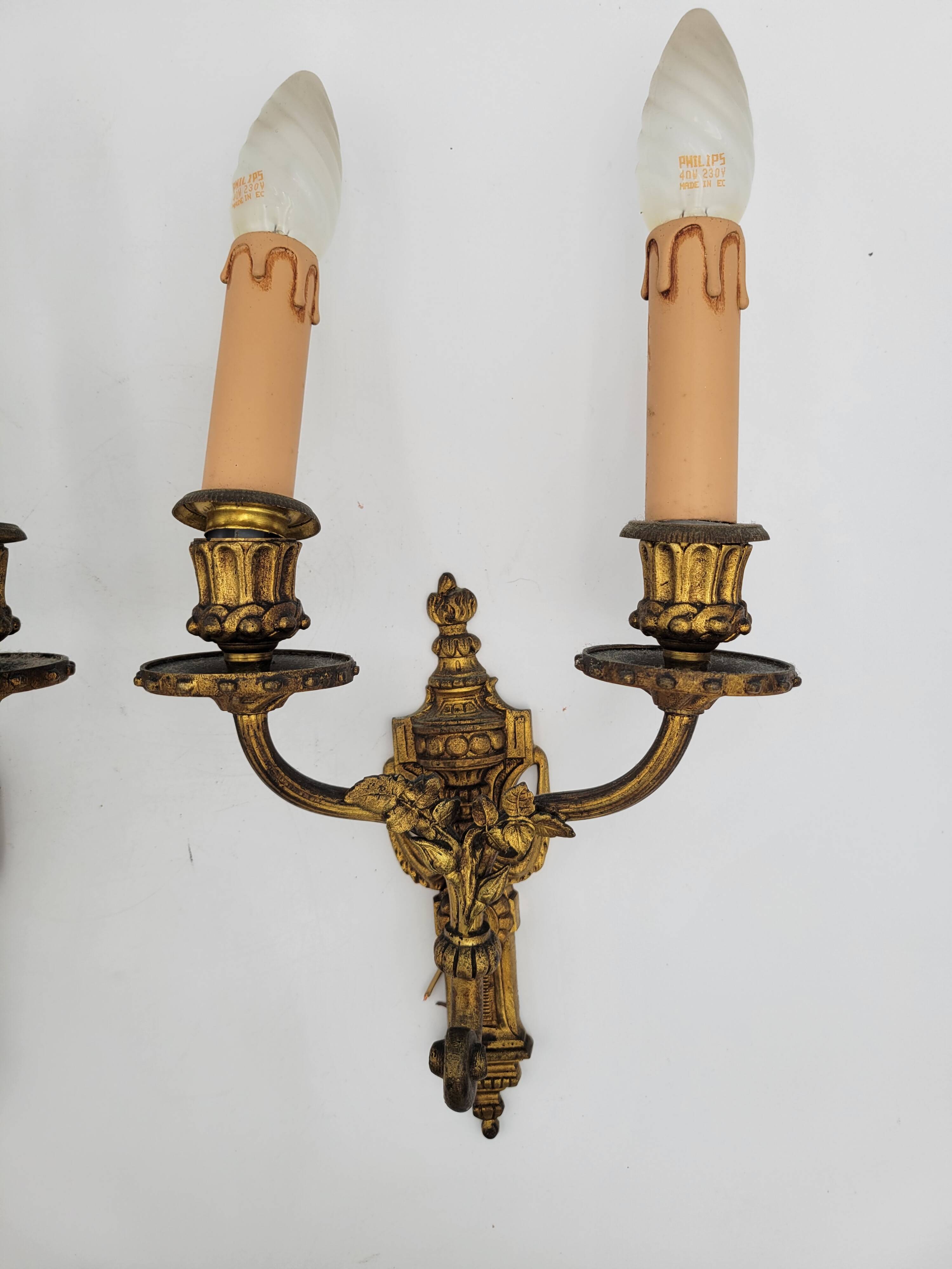 Antique Louis XVI style bronze wall lights