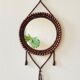 Miroir mural vintage en perles de bois