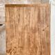 Vintage farmhouse table with turned legs.