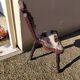Brutalist tripod chair in wood and vintage leather