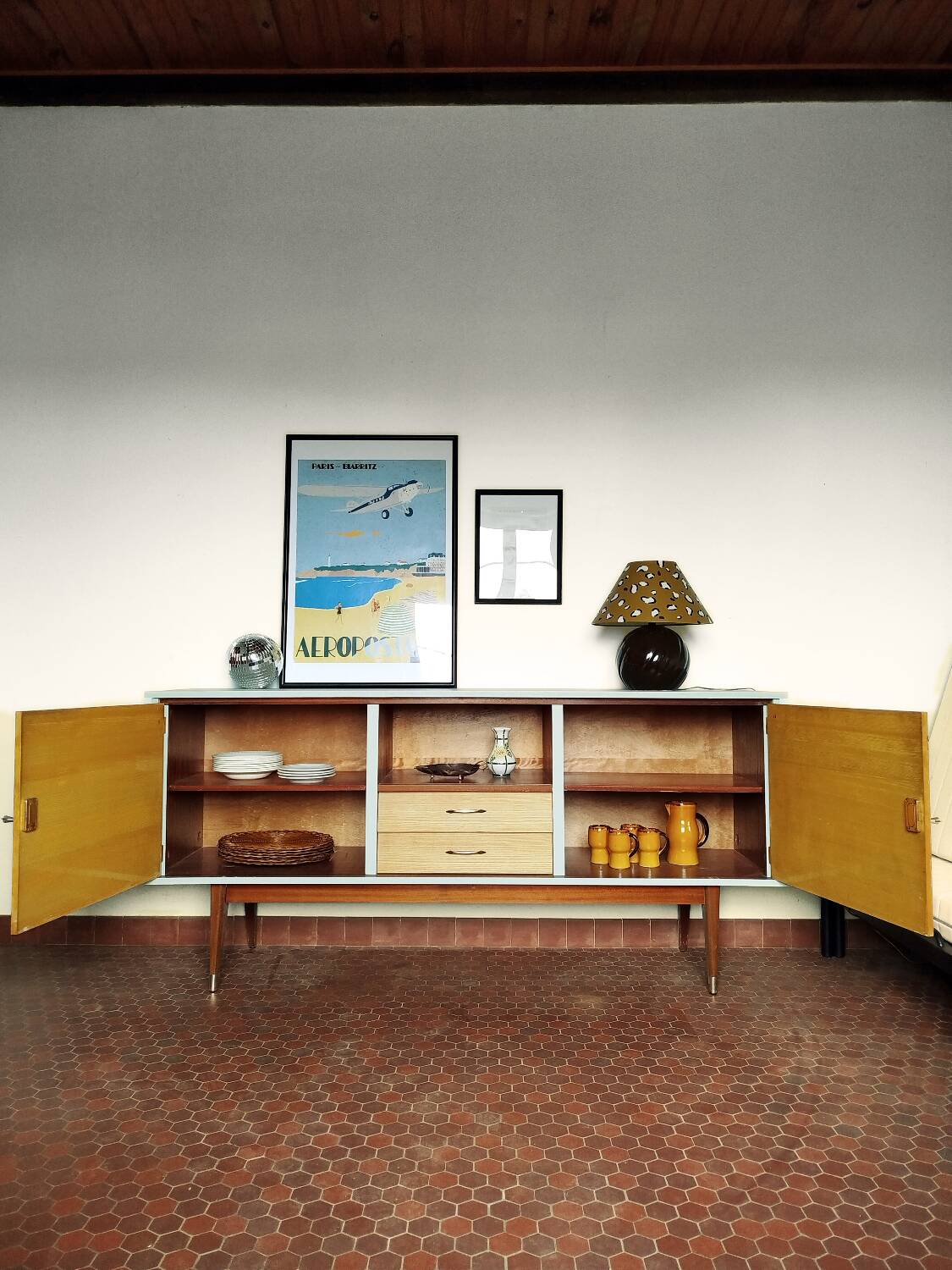 Wooden sideboard in soft green