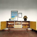 Wooden sideboard in soft green